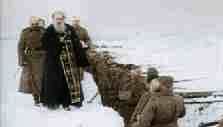 An Orthodox priest blesses the troops
