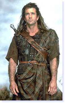 William Wallace as portrayed by Mel Gibson. The Highland dress is of one of the few authentic items in the film, but would not have been worn by Walllace, who was a lowland squire descended from the Normans!!